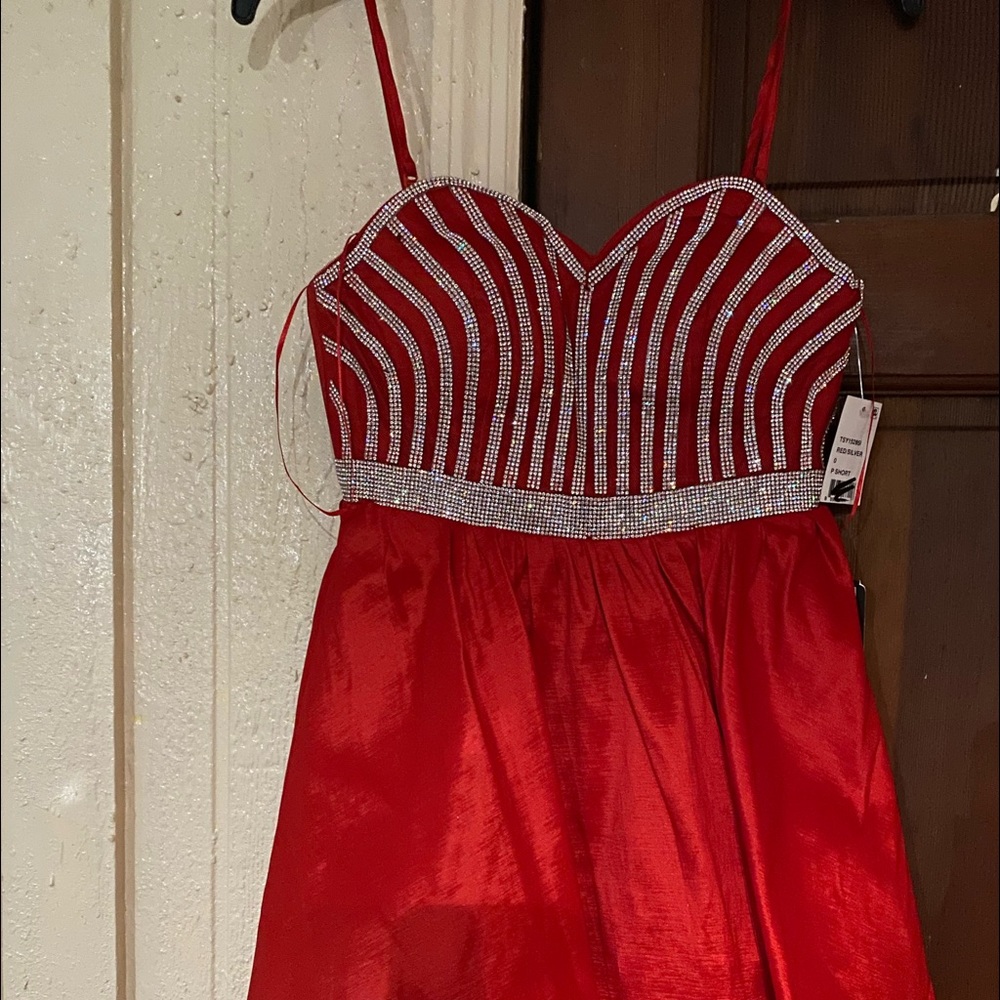 I’m selling Crystal Doll dresses from macy’s. It has bling bling